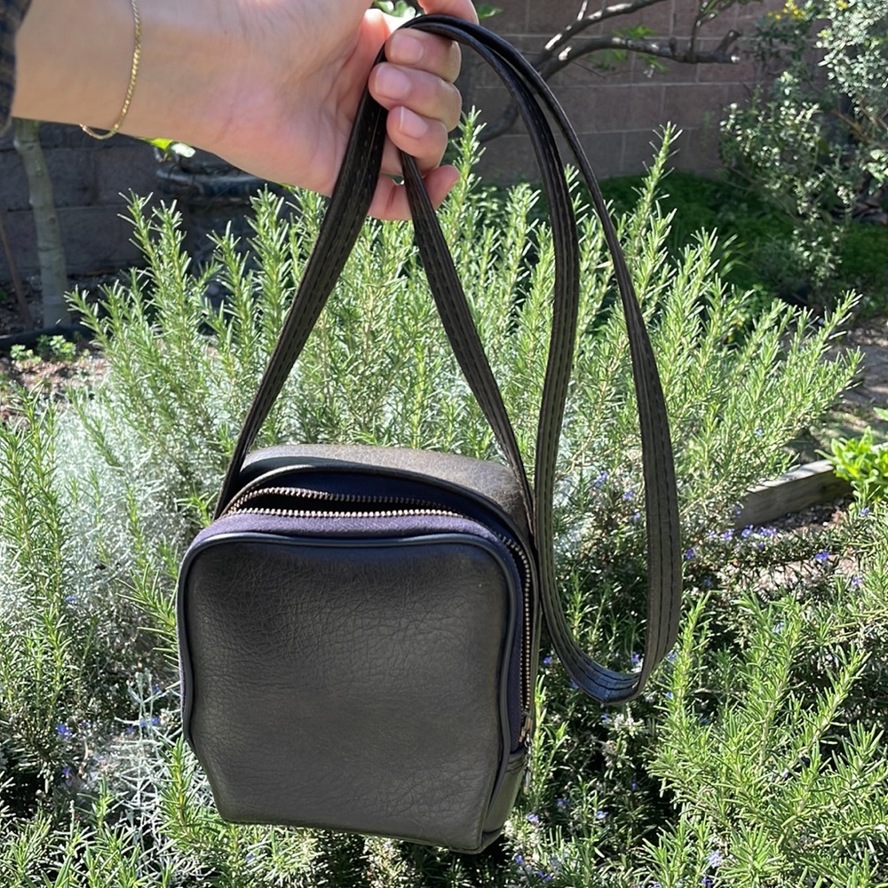 Vintage Camera Bag in Camo Green. Vegan leather with faux fur inside.